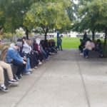 Teenagers are sitting in the park