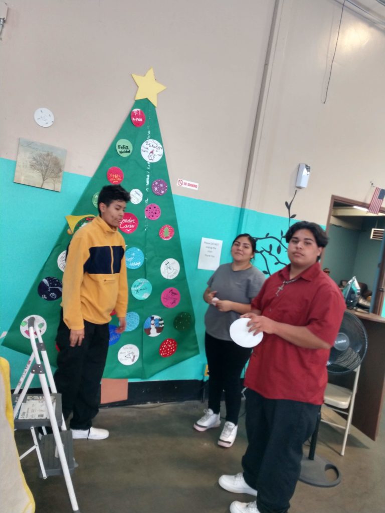 Teenagers are making handmade Christmas tree