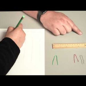 Two hands, ruler and pencil with paper